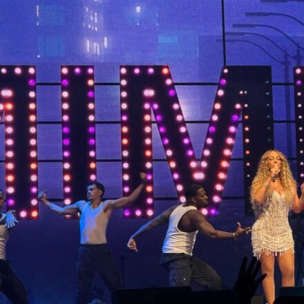 Mariah Carey performing on stage; her songs inspired this week's Dancing with the Stars theme night