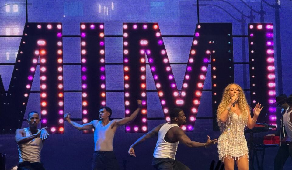 Mariah Carey performing on stage; her songs inspired this week's Dancing with the Stars theme night