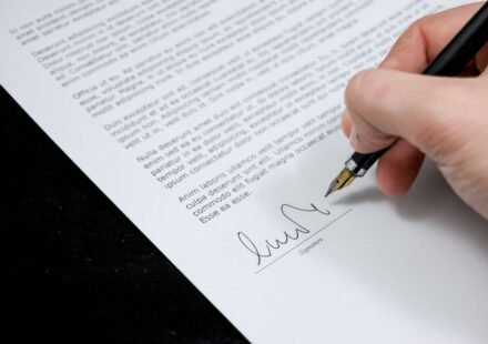 Hand signing a petition document with a fountain pen — illustration for Gypsy Rose Blanchard's anti-cyberbullying petition