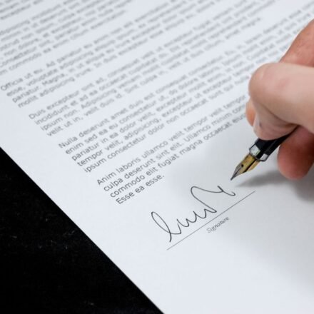 Hand signing a petition document with a fountain pen — illustration for Gypsy Rose Blanchard's anti-cyberbullying petition